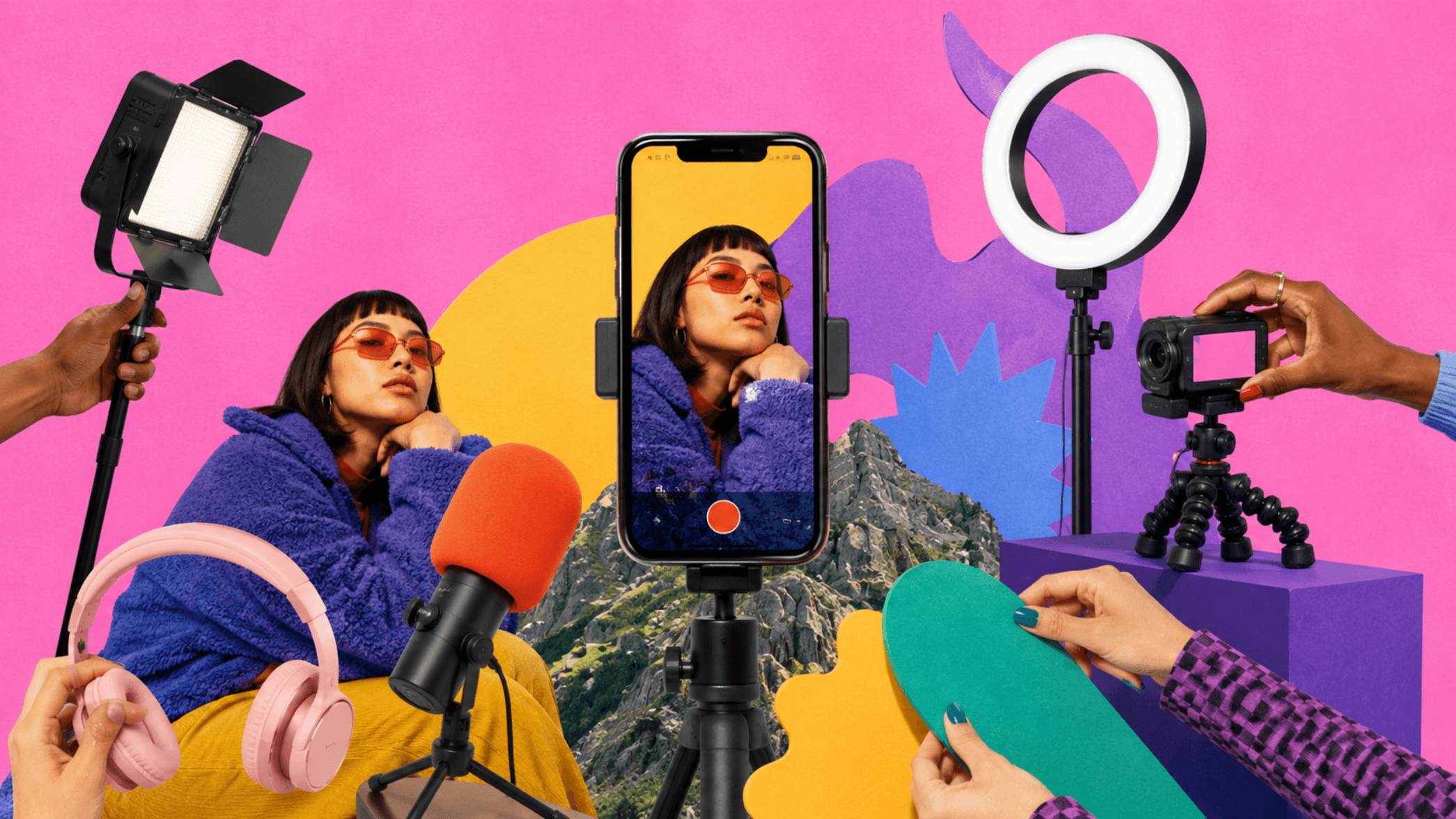 Image of a content creator surrounded by colorful filming equipment.